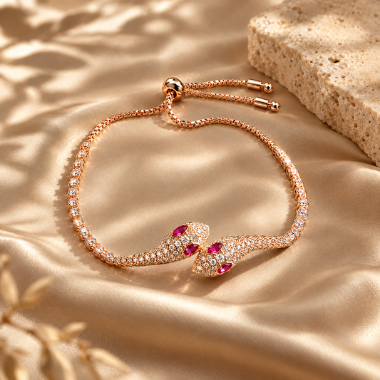 Ruby Serpent Bracelet with pave stones and ruby eyes on champagne satin